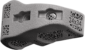 Carlsmed aprevo implant product image showing its titanium lattice, contoured surfaces, and device markings