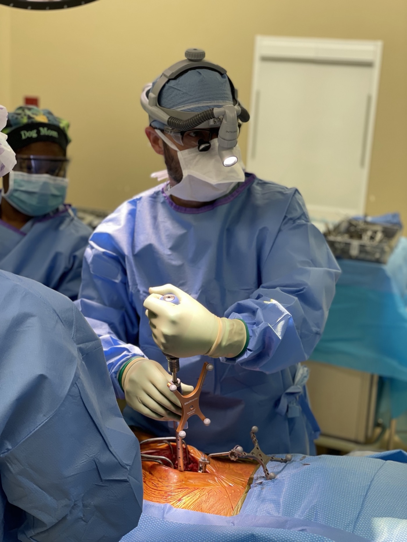 Dr. Jonathan Hobbs performing minimally invasive spine surgery in the operating room